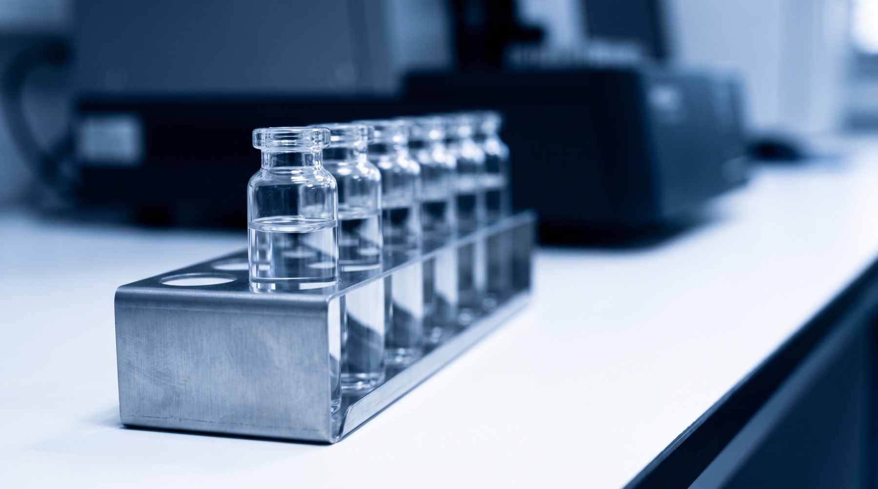 Sealed vials photographed on receipt at the laboratory